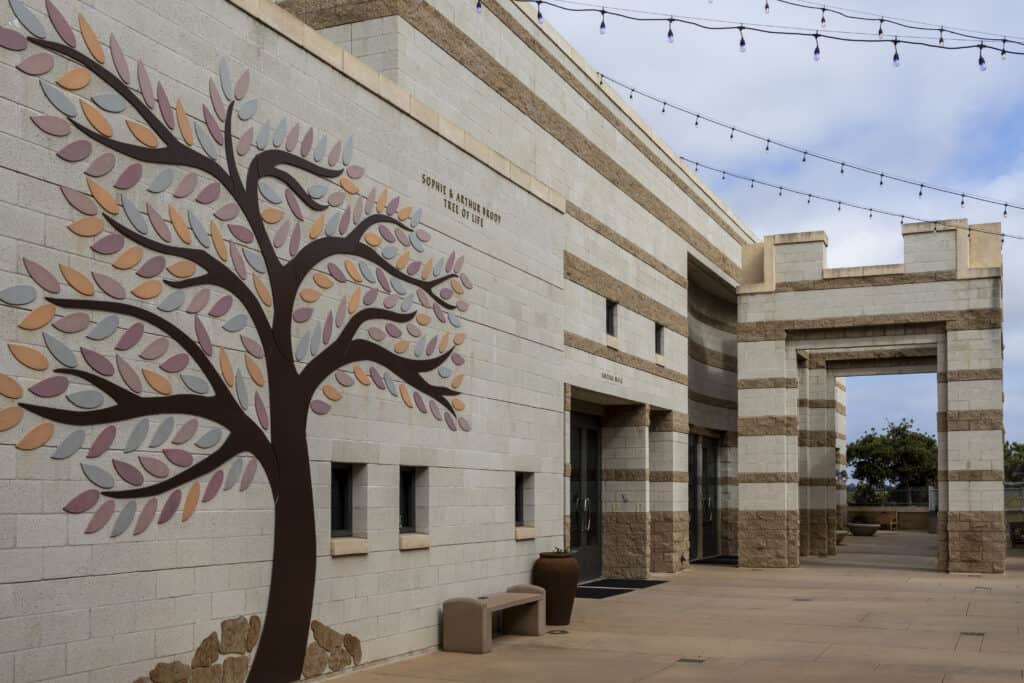 The CBI courtyard featuring the Tree of Life wall.